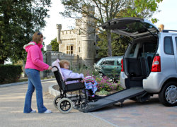 caregiver helping an elder